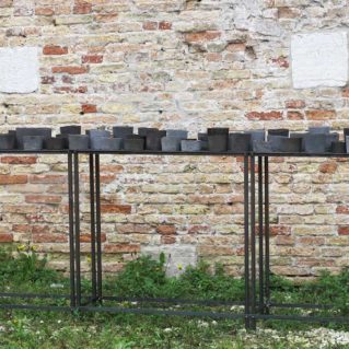 Cristina Treppo, 2019, resina-cemento, strutture di ferro, 113x306x44cm, opera permanente per Spazio Thetis, Venezia
